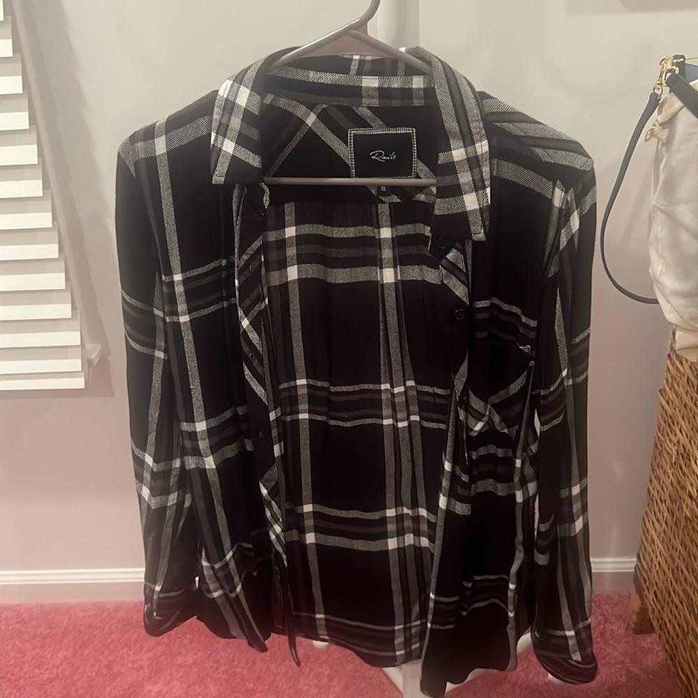 Black, white and gray plaid button down, long sleeve shirt